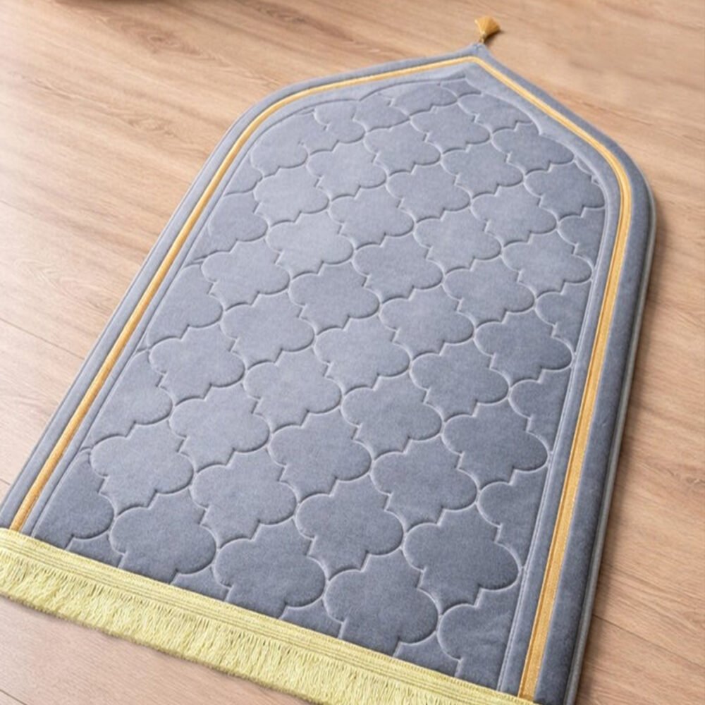 Premium MySalahMats prayer mat with mihrab inspired arch design and soft cushioned surface Lightweight Islamic prayer mat with gold trim, fringe detail and anti slip base Comfortable plush prayer mat with geometric quilting and golden tassel for daily salah use