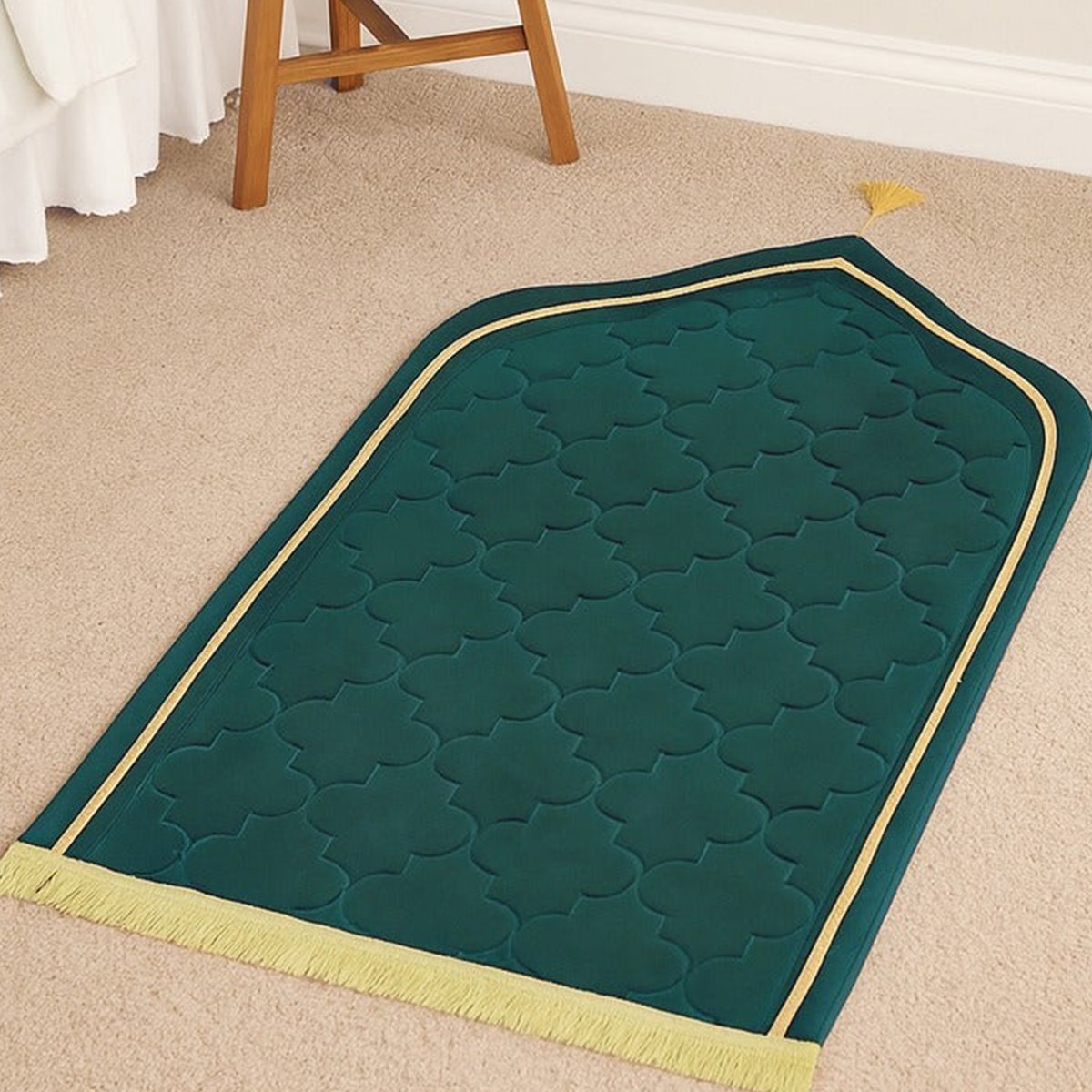 Premium MySalahMats prayer mat with mihrab inspired arch design and soft cushioned surface Lightweight Islamic prayer mat with gold trim, fringe detail and anti slip base Comfortable plush prayer mat with geometric quilting and golden tassel for daily salah use