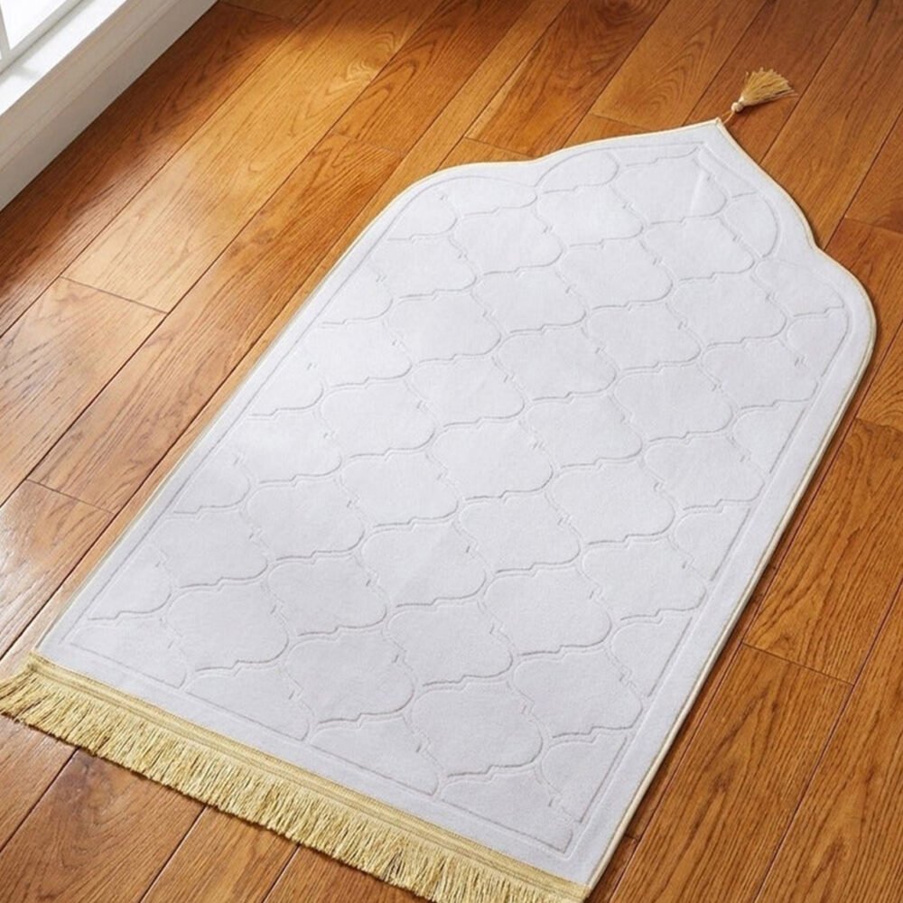 Premium MySalahMats prayer mat with mihrab inspired arch design and soft cushioned surface Lightweight Islamic prayer mat with gold trim, fringe detail and anti slip base Comfortable plush prayer mat with geometric quilting and golden tassel for daily salah use